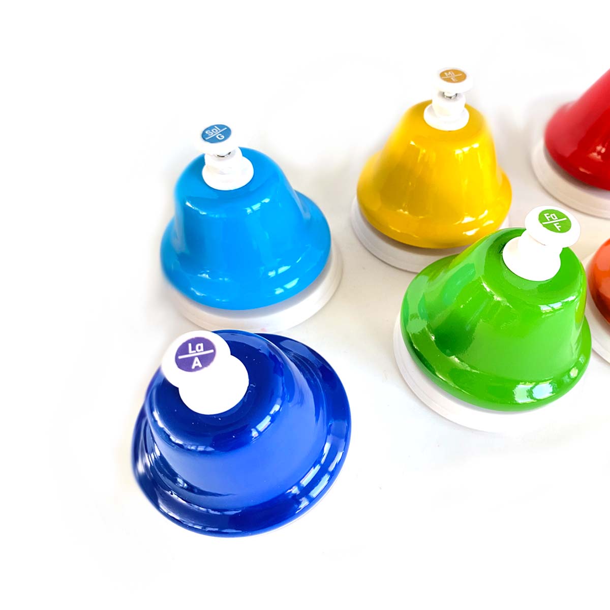 green, yellow, blue, red and purple music desk bells